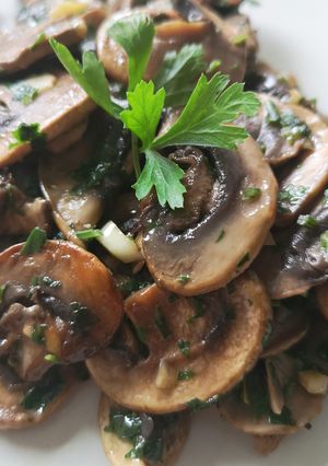 O poză a rețetei Ciuperci champignon trase la tigaie.