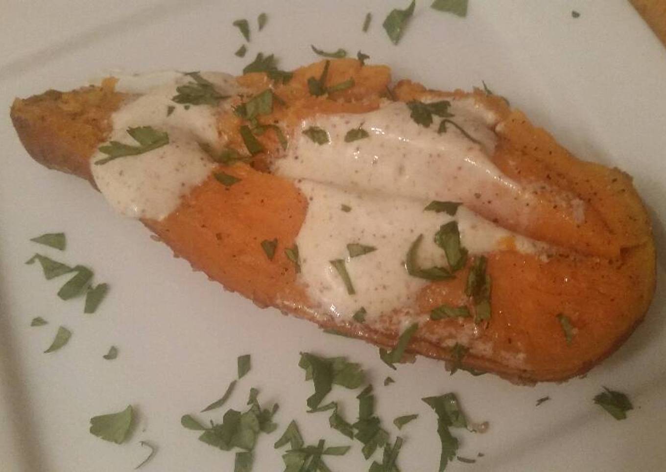 Baked sweet potatoes with cumin and whipped cream
