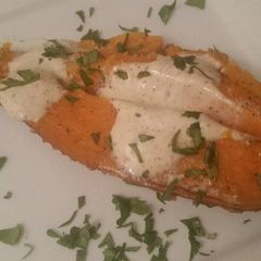 A picture of Cumin Baked Sweet Potato w/ Ancho Crema.