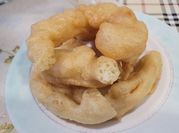 Una foto de churros y porras