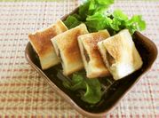 A picture of cheesy bread slice
