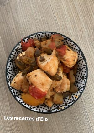 Une photo de Poulet champignons et tomates