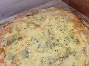 Una foto de pizza provolone