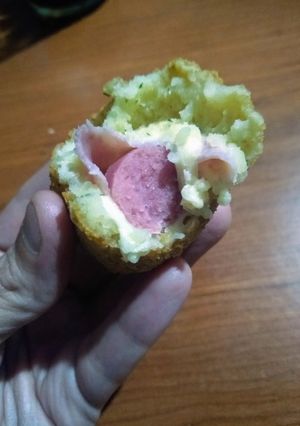 Una foto de Salchichas envueltas en puré de papas