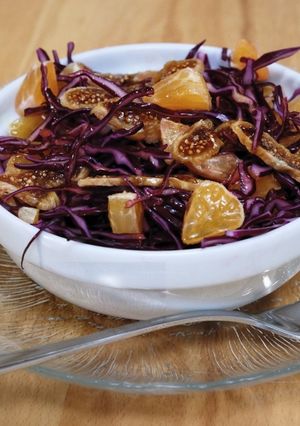 A picture of Red cabbage salad with clementines and dried figs.