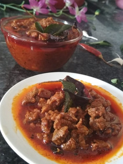 A picture of Mutton pickle (gosht ka achar).