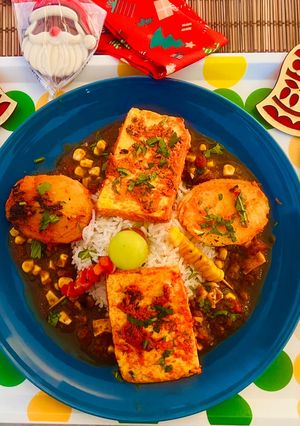 A picture of Tawa Paneer Steak on Garlic Rice with Vegetarian 🌱 🍅Gravy ~Unique Party Fusion🥳😋❣️.