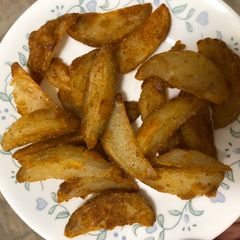 Potato wedges A picture of Potato wedges.