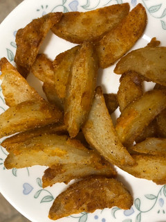 A picture of Potato wedges.