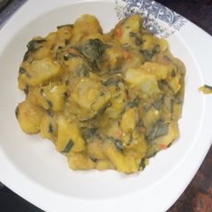 A picture of Yam Pottage with Scent leaf.