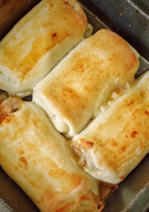 A picture of 3 spice chicken filled bread.