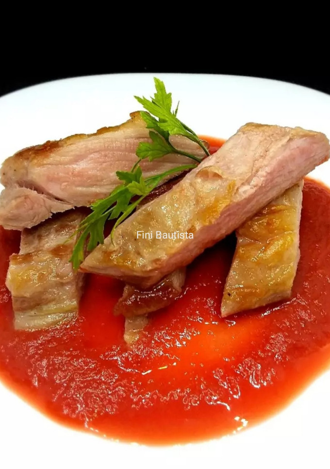 Una foto de Secreto de cerdo con crema de remolacha