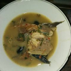 A picture of Nsala with catfish.