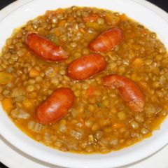 Lentils with vegetables and choricillos soup A picture of Lentils with vegetables and choricillos soup.