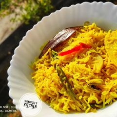 A picture of Peeley Chawal/ Namkeen Chawal.
