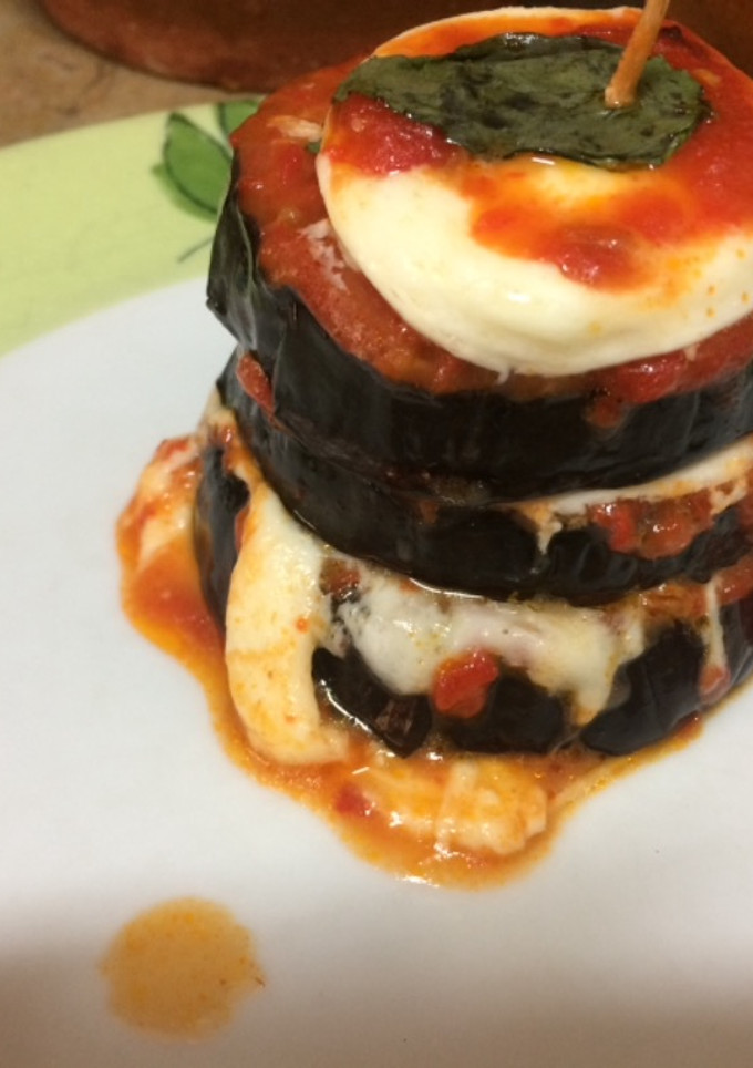 Una foto de Berenjenas a la parmesana