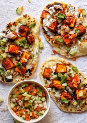 A picture of Panner tikka naan tacos.