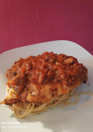 Una foto de Milanesa parmesana de cerdo