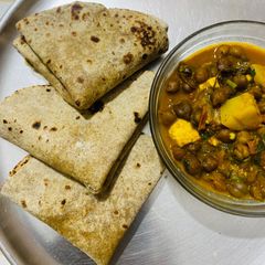 A picture of Ragi Matar Roti with a hint of Kasoori Methi.