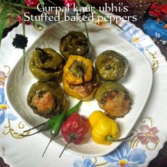 A picture of Stuffed baked peppers 🫑🌶️🥕🫛.