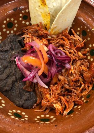A picture of Cochinita Pibil (Yucatán).