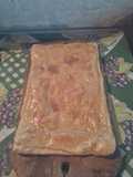 Pastel de mortadela y salsa blanca hojaldrado