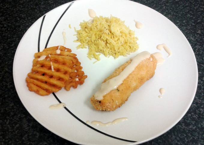 How to Make Perfect chicken roll with a cream spiced fillin, paprika rice, crispy potato slice &amp; four cheese sauce
