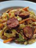 Sautéed cabbage and carrot with sausage