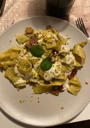 A picture of Pappardelle with Pistachios, Béchamel, and Speck.