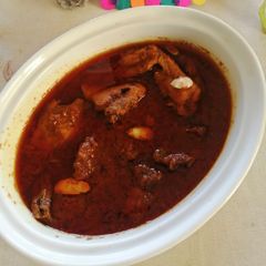 A picture of Chicken qorma.