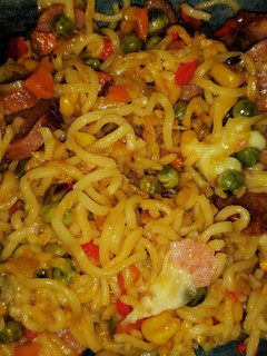 A picture of CHEESY VEGETABLES SAUSAGE NOODLES 🍜😋 #themechallenge.
