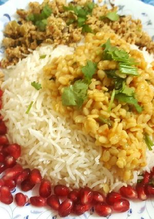 A picture of White lentil curry with rice chapli kebab & fresh pomogrante 😍.