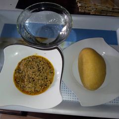 A picture of Egusi Soap and Eba.
