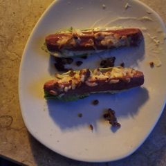 A picture of Low-carb zucchini sticks with chicken sausage.