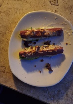 A picture of Low-carb zucchini sticks with chicken sausage.