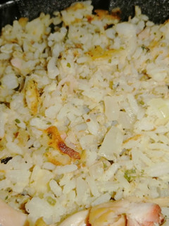 Una foto de Revuelto de arroz, jamón y queso