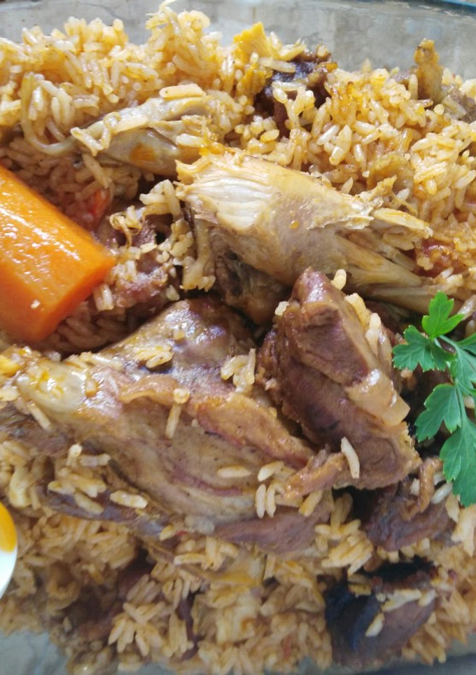 Una foto de Arroz con carne de ternera y pollo