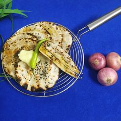 Stuffed Onion Kulcha On Tava A picture of Stuffed Onion Kulcha On Tava.
