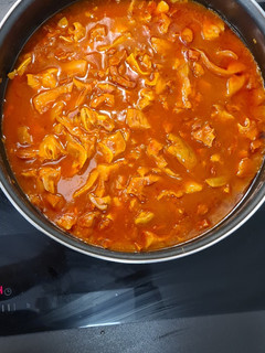 Una foto de Oreja y morro en salsa con chorizo