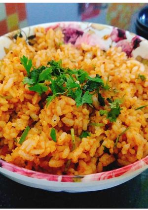 A picture of Tamarind Rice / puliogree.