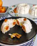 Carrot Halwa in a Frozen Cashew Apple Phirni Mousse Cake
