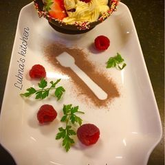 A picture of Chocolate Bowls with Cream cheese Mousse & Berries:.