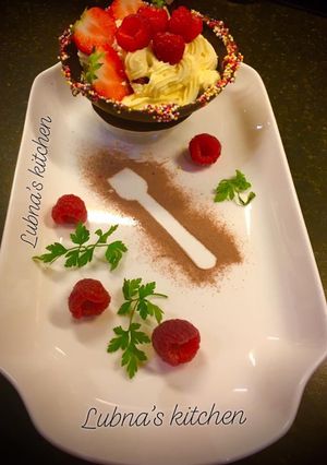 A picture of Chocolate Bowls with Cream cheese Mousse & Berries:.