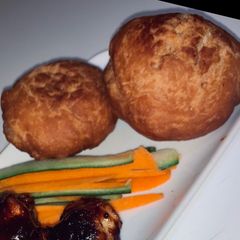 A picture of Caribbean Fried Bakes aka Dumplings/Festivals.