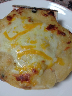 Una foto de Vieira rellena de marisco gratinada con bechamel al horno