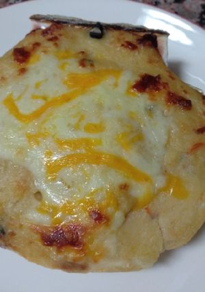 Foto principal de Vieira rellena de marisco gratinada con bechamel al horno