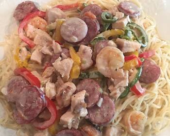 Easy Fast Cooking Chicken Shrimp  Sausage with Alfredo Sauce on Angle Hair Pasta Practical Delicious