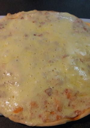Una foto de Pizza con Muzzarella