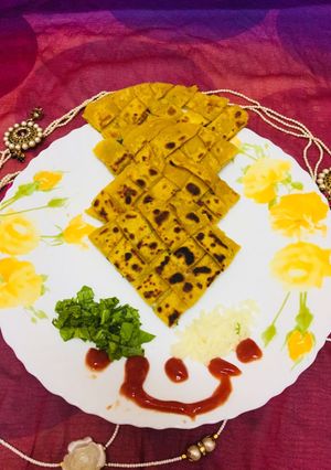 A picture of Checks spinach cheese paratha.