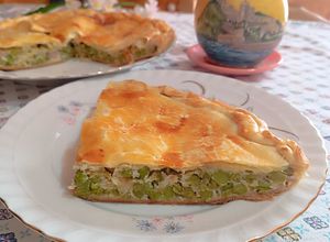 Foto di Pizza con piselli e caciocavallo giovane